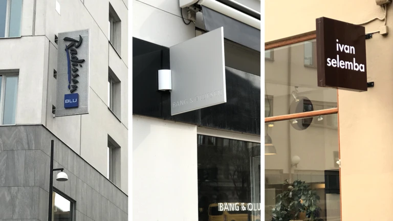 Tre flaggskyltar på fasad: Radisson Blue, Bang & Olufsen samt Ivar Selemba