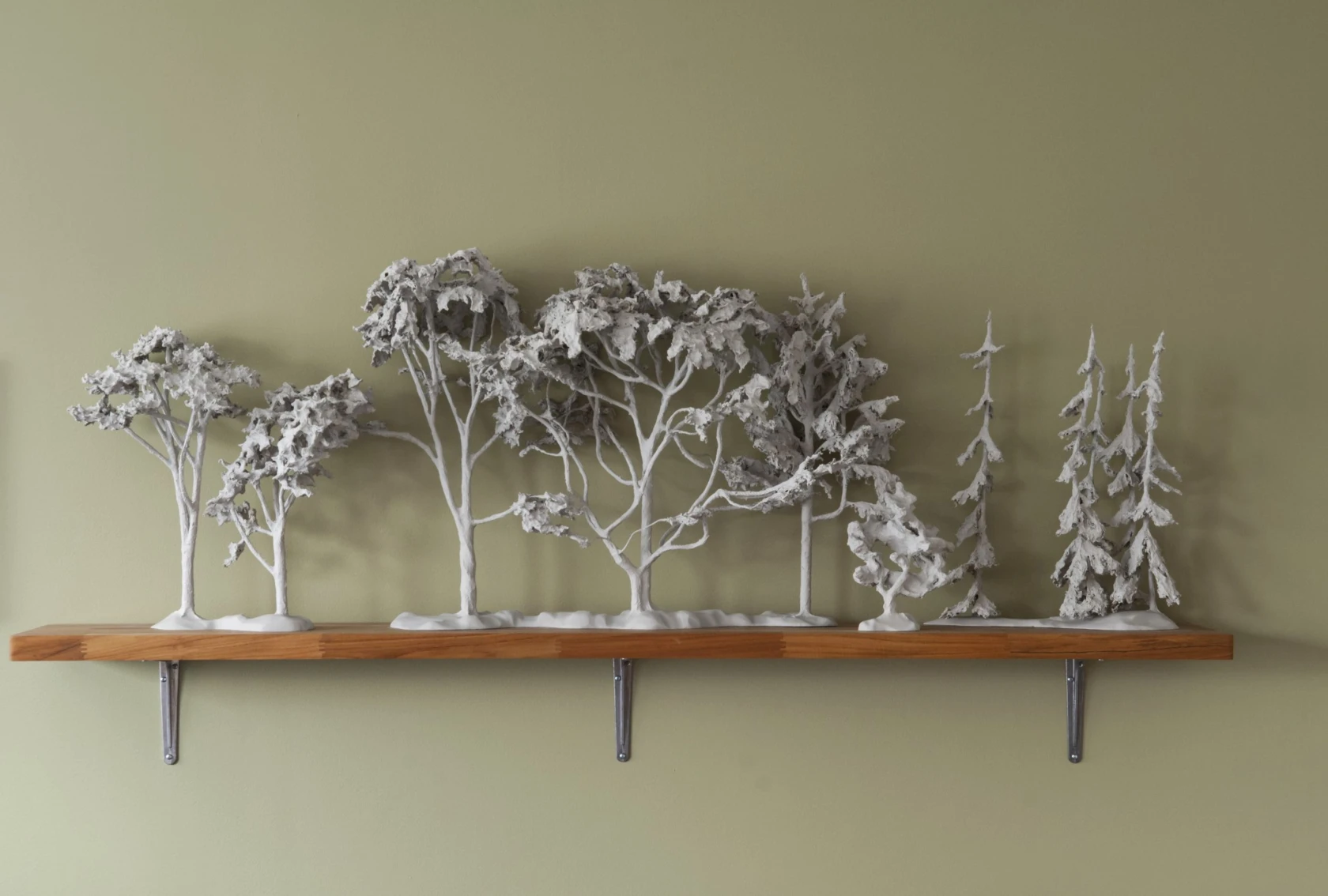 Skulptur föreställande träd.