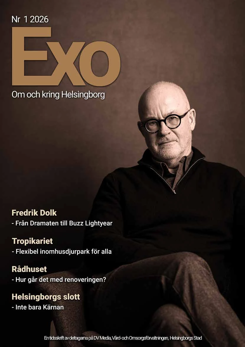 Framsida på tidningen Exo. En skallig man med glasögon sitter ner.
